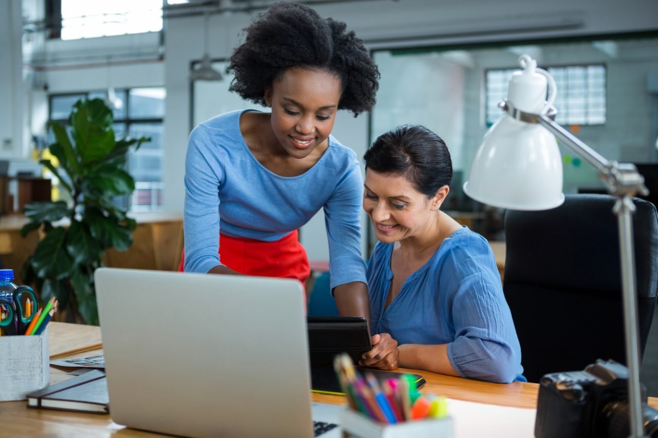 Female graphic designers using graphic tablet